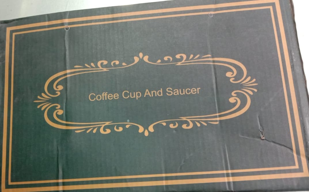 ceramic coffee cup with automatic heating pad | only in green color. ceramic coffee cup with automatic heating pad | only in green color.